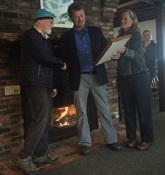 Ken receiving award from past RMS President Jim MacCartney, RMS NE Chapter officer Lelia Mellen