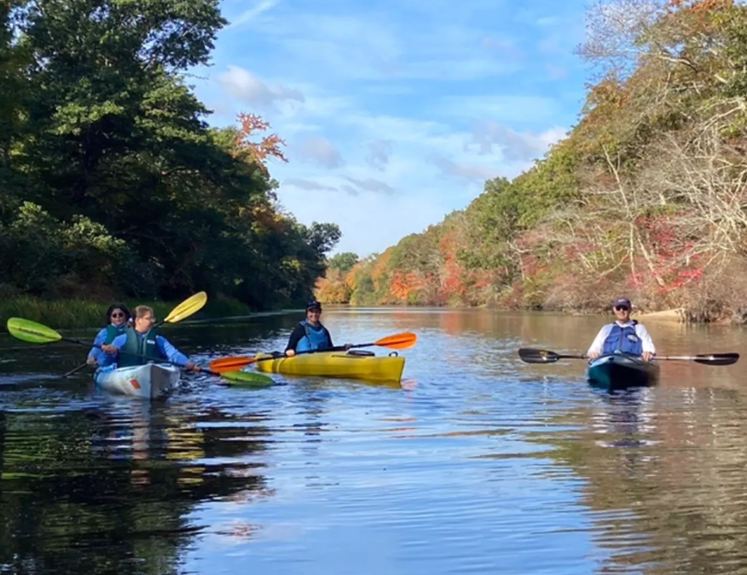 Jon Ericson, Stewardship Council Chair and Westerly Representative, and Lauren Barber, Westerly Representative,  host a paddle for Town Planner Nancy Letendre and her daughter. Photo by Bill McCusker.